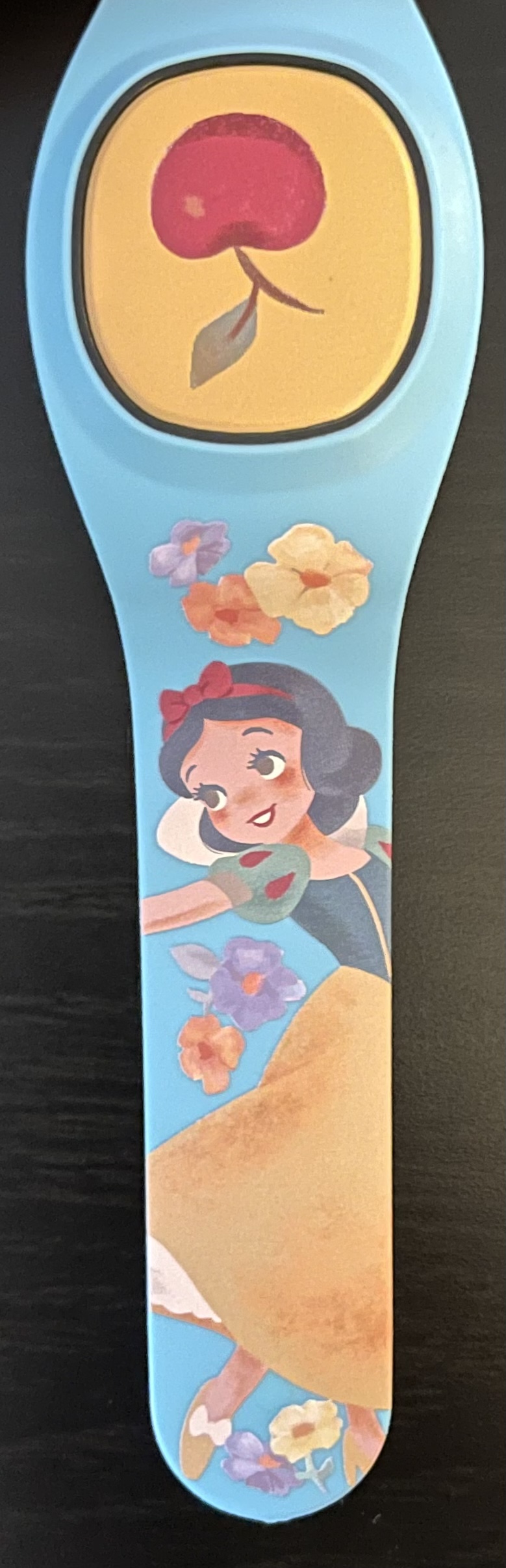 Snow White and the Seven Dwarfs Limited Release MagicBand is now out for purchase